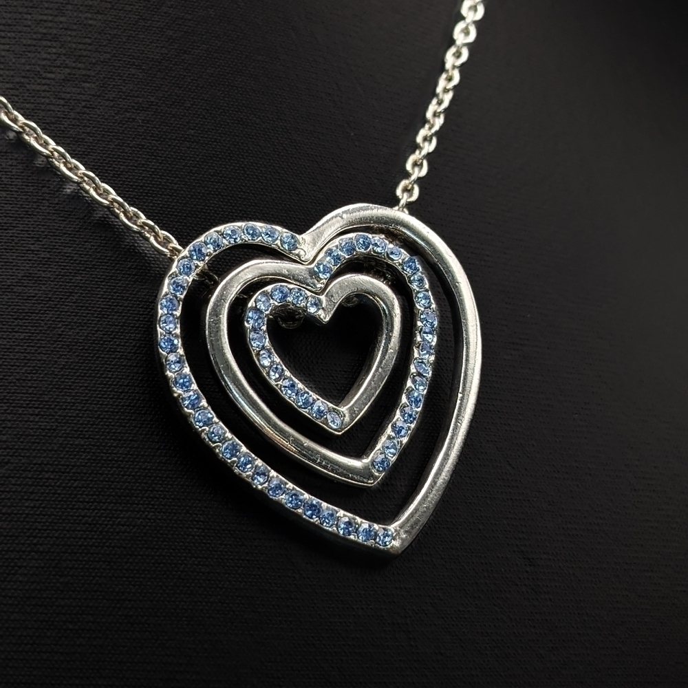 TRIPLE Heart Necklace With Blue Crystal Accents In Silver Tone